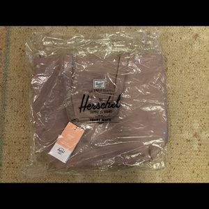 Mica Tote from Herschel Supply Co.   Brand new in packaging.  Zipper closure.